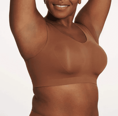 Black woman wearing a dark brown (