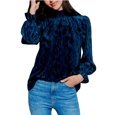 blouse in pretty print from Tucker NYC, silky turtleneck blouse with blue and black abstract print on it