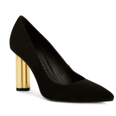 pump with a gold fluted column for a heel