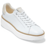 white sneaker with beige lining around the sole