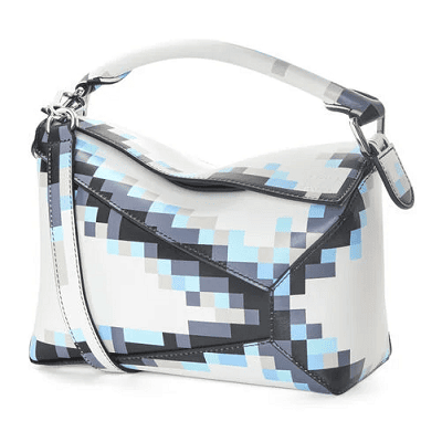white puzzle bag with pixelated details along seaming of puzzles