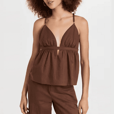 brown camisole with tortoiseshell details and peekaboo bit below the imperial waist