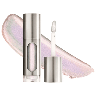 pinky opal highlighter in silverish tube, product is superimposed on top of swipe of the product