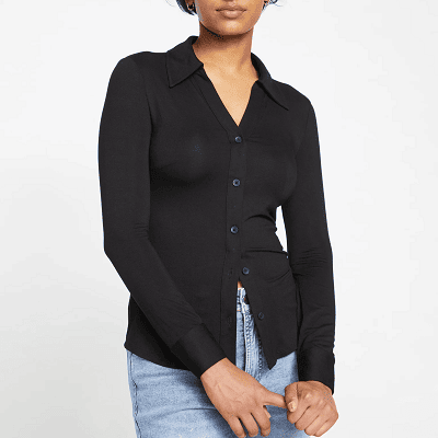 woman wears black stretchy button-front blouse 