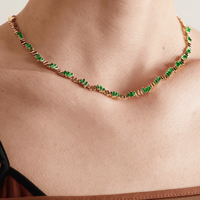 necklace with alternating areas of tiny emeralds and tiny diamonds