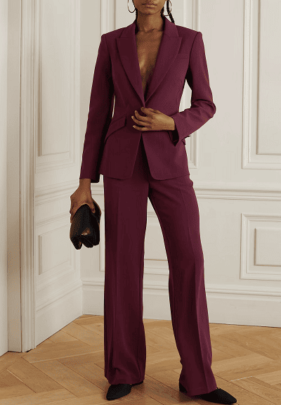 Black woman wears burgundy suit
