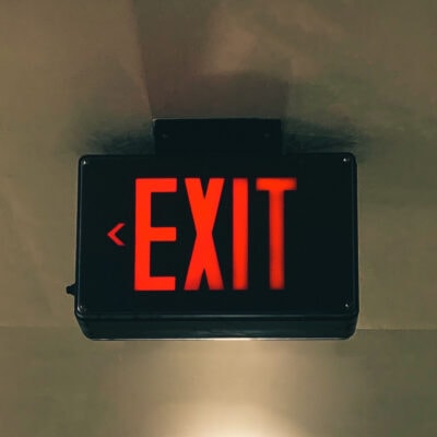 red-lighted EXIT sign