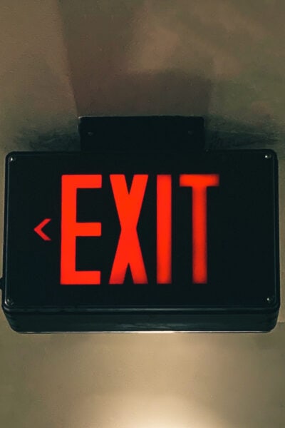 red-lighted EXIT sign