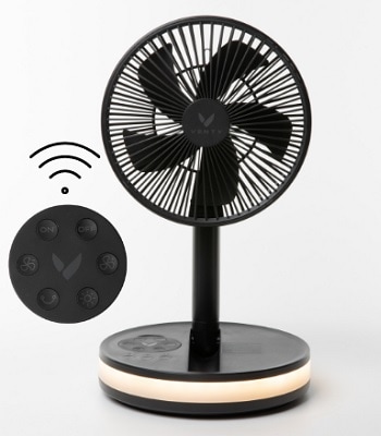 A black wireless fan next to its remote