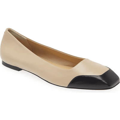 beige square-toe flat with unusual black captoe