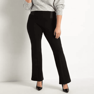 A woman wearing a black flare trouser