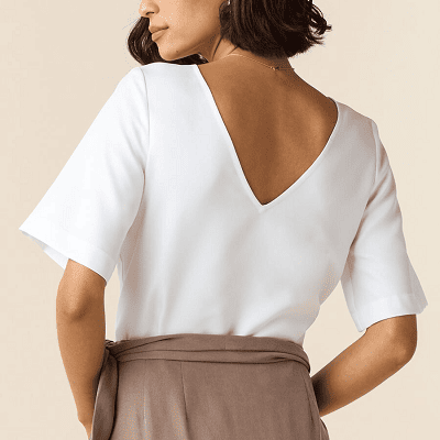 white blouse for work with deep V in the back; it is reversible