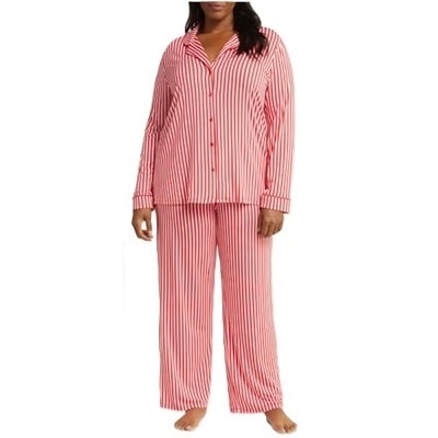 A woman wearing red-and-white striped pajamas