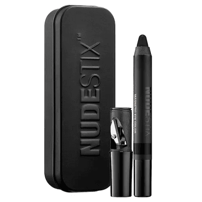 black thick eyeliner next to pencil sharpener and black tin reading NudeStix