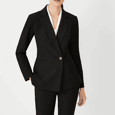 woman wears black double-breasted blazer with white blouse