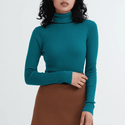 one of the best merino wool sweaters for women: an ultrafine merino wool turtleneck in turquoise from Uniqlo