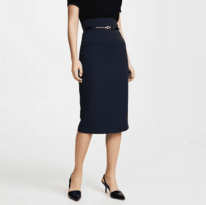 one of the best pencil skirts for work, a high-waisted style from Black Halo - the model is styled wearing navy with black