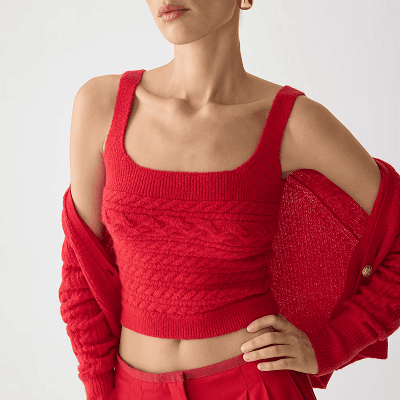 red sweater set; the cable knit is going horizontally and both pieces are cropped