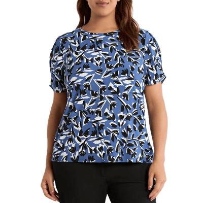 woman wears plus-size tee with interesting pattern and tulip sleeves