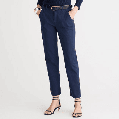 woman wears navy pants with black belt (Kate style from J.Crew)