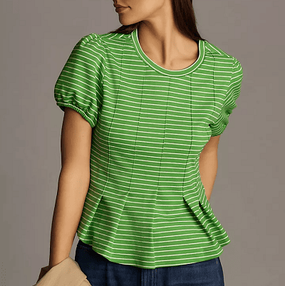 a dressy top for business casual outfits: a striped green top with corset detailing, a peplum, and puffed sleeves