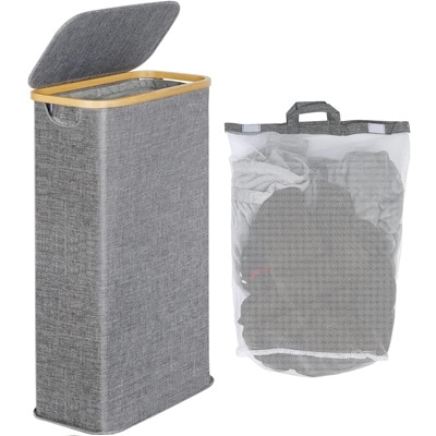 A gray hamper and mesh laundry bag