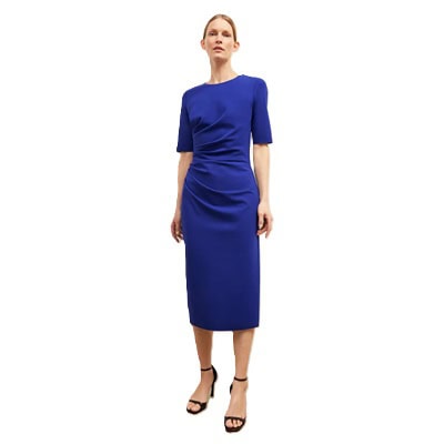 A woman in a blue midi dress
