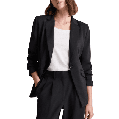 woman wears affordable black pantsuit