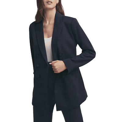 young professional woman wears stylish navy pant suit