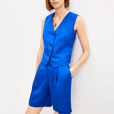 woman wears cobalt vest with matching shorts