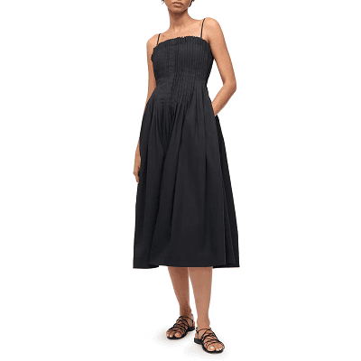 black dress with pleat details and pockets