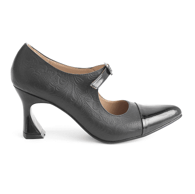 black Mary Jane heel with pointed cap toe in patent leather, matte tooled leather on body of shoe, and a heel with an interesting fluted shape