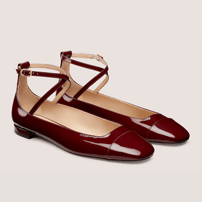 red patent leather flats with cap toe and criss cross ankle straps