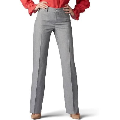 A woman wearing a red long sleeve top and gray trouser pants