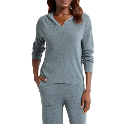 woman wears dusty blue sweater hoodie with matching pants