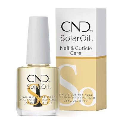 A bottle of CND SolarOil nail care oil with the box next to it