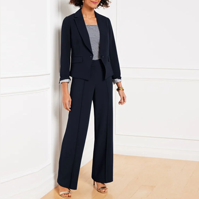 female professional wears travel-friendly suit
