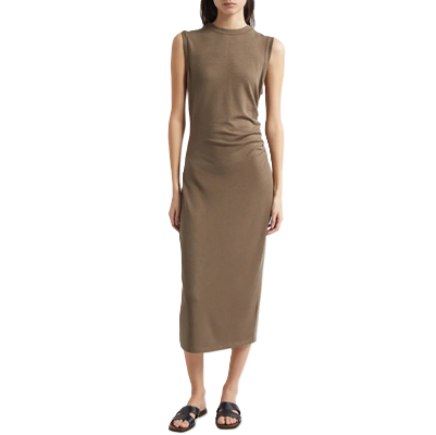 woman wears modern sheath dress from vince with ruched sides