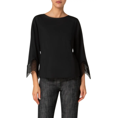 black top with unusual wavy lace detail at slaves