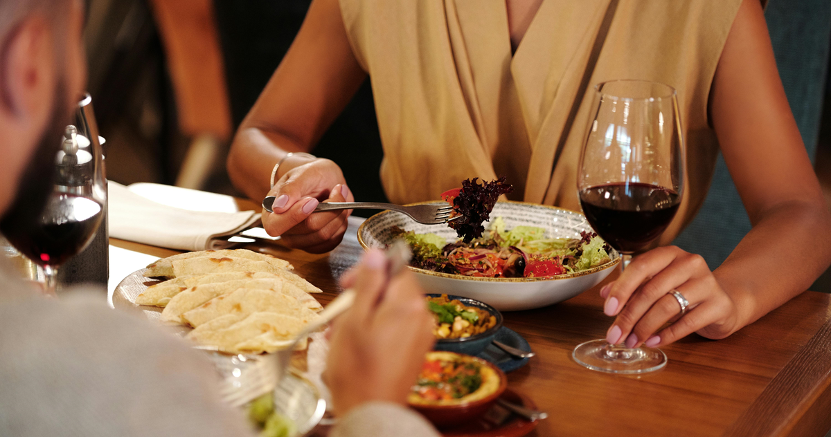 man and woman have romantic dinner
