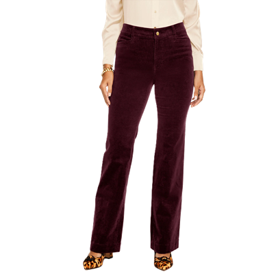 woman wears dark burgundy corduroys for work with leopard print shoes
