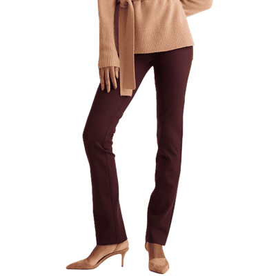 woman wears pull-on pants for work; they are a dark burgundy pants in Ultra Stretch ponte and she is wearing a beige sweater and beige heels