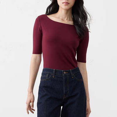 woman wears elbow-sleeve top