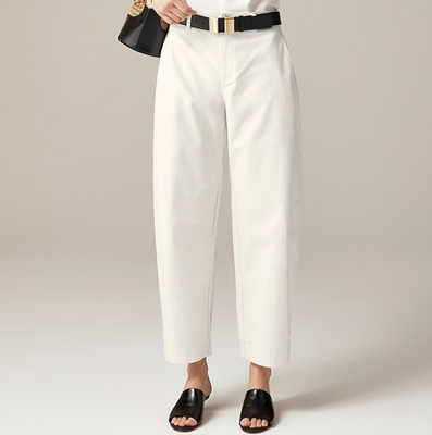 woman wears white barrel pants with a work outfit