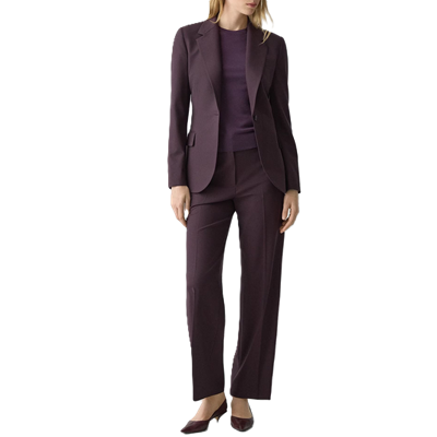 woman wears dark purple suit with pants that Kat thinks are the wrong height for the shoes