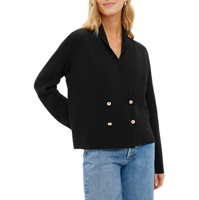 woman wears black knit sweater blazer
