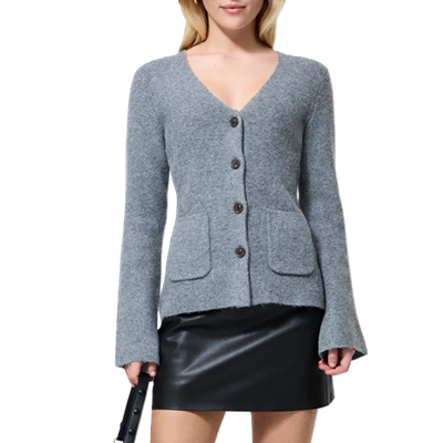 woman wears blue cardigan