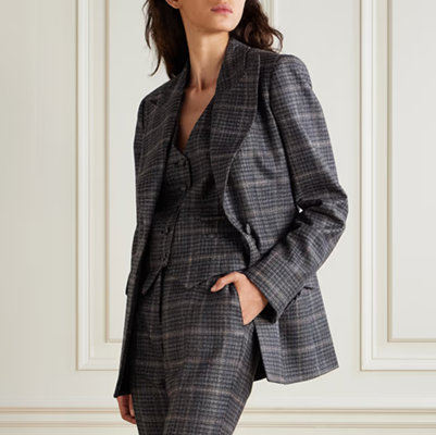 woman wears sleek print suit