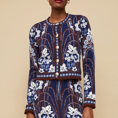 A woman wearing floral abstract printed jacket