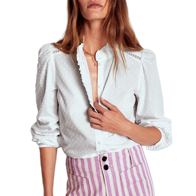 professional woman wears white blouse with interesting collar